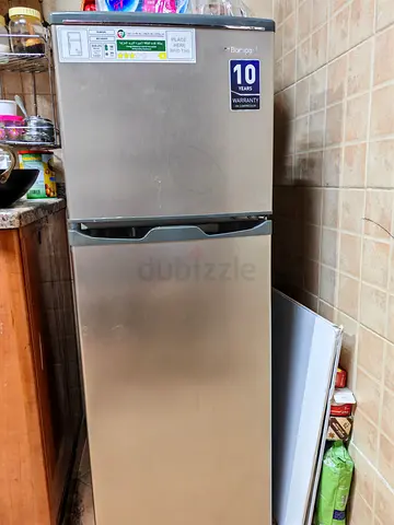 Medium-sized double-door refrigerator in excellentworking condition