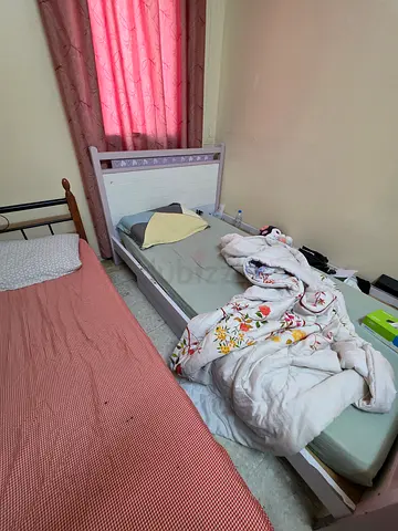 Single wooden bed frame with mattress - used