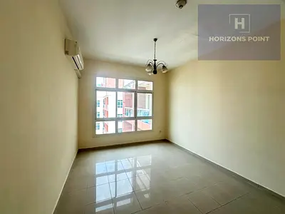 Bright 1BR Apartment | Near Souq Extra - DSO - Semi Closed kitchen
