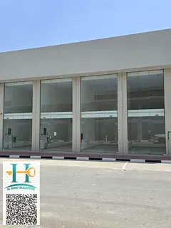 Commercial building in Ajman Al-Halio consisting of 4 shops and Mizan _ Free ownership street and ne