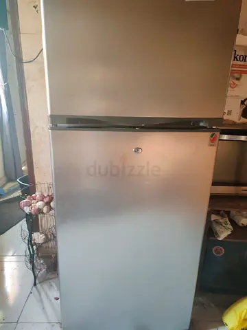 Silver double-door refrigerator - good working condition