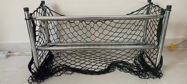 Shoe rack extendable compact with bonus net superbly preloved 33dhs no lowballer