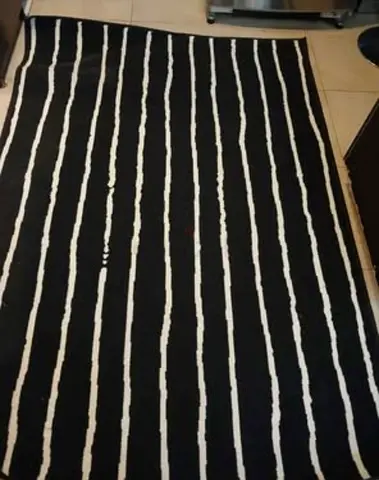 IKEA Black and white striped rug - good condition (135 CM X 139 CM)