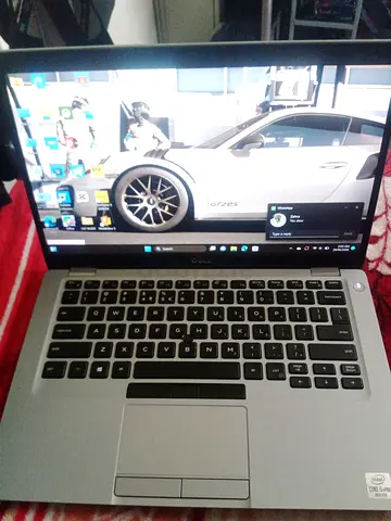 Dell Latitude laptop - 14-inch, silver, working condition