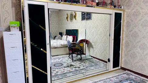 Large mirrored sliding wardrobe with velvet panels - good condition