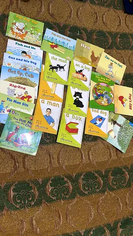 Lot of about 12 assorted childrens picture and beginner reading books