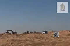 Residential land for sale in Umm Al Quwain with a convenient installment plan including all fees. Gr