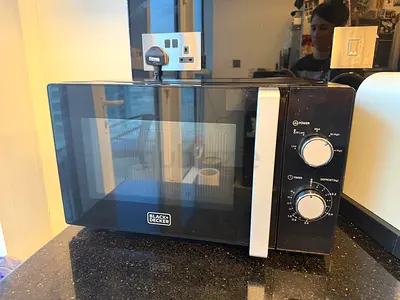 Black  Decker Compact Countertop Microwave - Good Working Condition