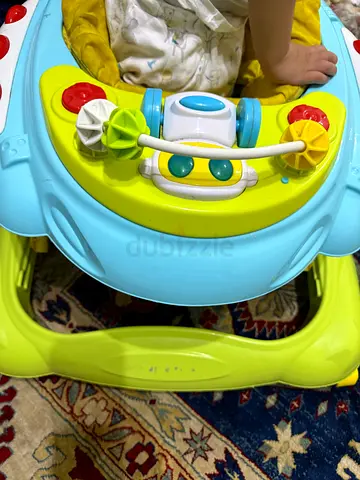 Lightweight baby walker with activity tray - gently used