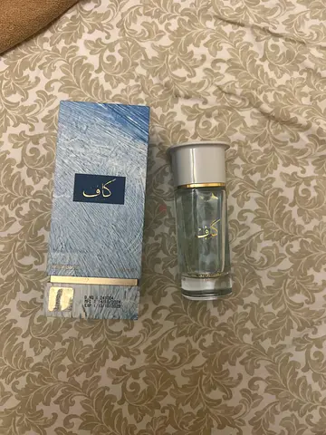 Used mens fragrance with box - light woody scent