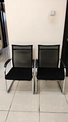 Pair of Black Mesh Visitor/Office Chairs with Chrome Frame