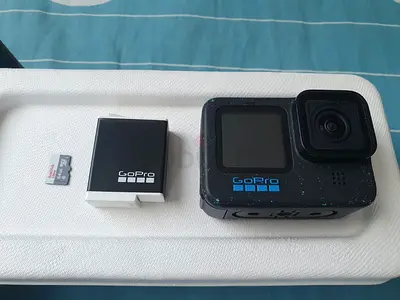GoPro 12 Black action camera with spare battery and 64GB microSD