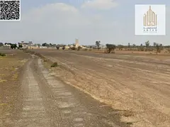 Large corner residential plot of land