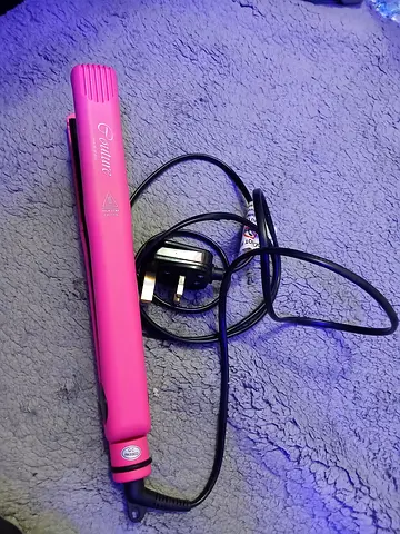 Pink hair straightener / Curlier flat iron in good working condition