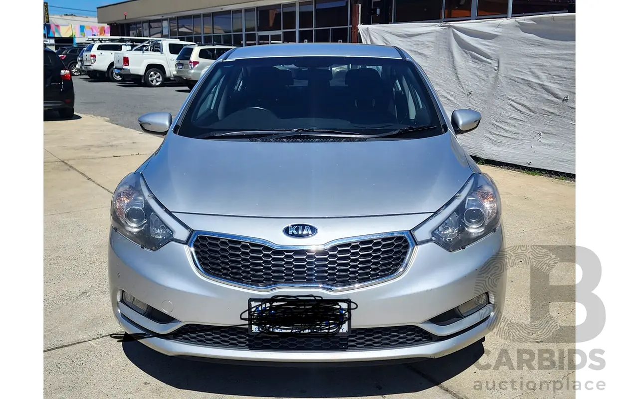 Kia Cerato 2013 — photo 1 of 6