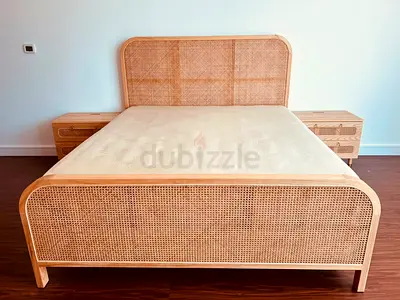 Natural Rattan King Bed Frame with Matching Nightstands (Side Tables). Original Cost AED 3637