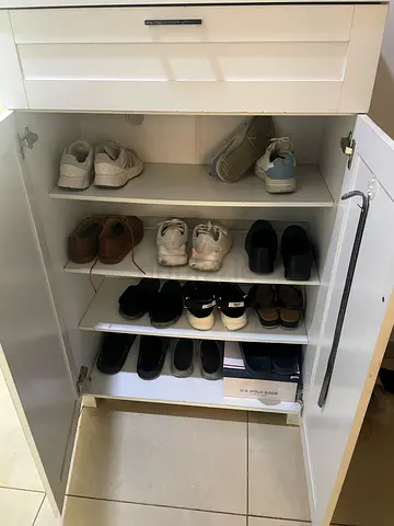 White shoe cabinet with multiple shelves - good condition