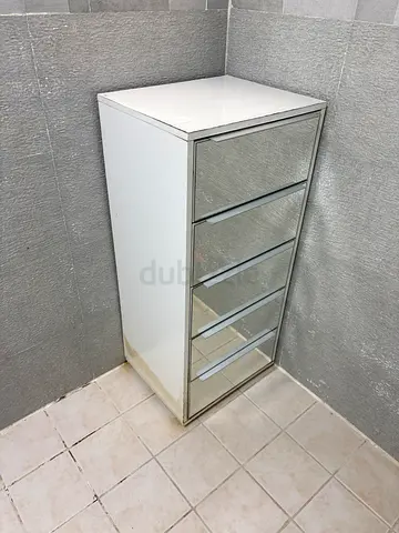 Tall white chest of drawers with 5 mirrored fronts - average condotion