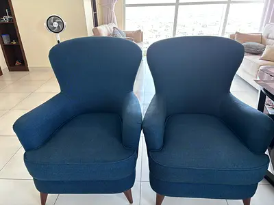 Pair of navy blue upholstered lounge chairs - good condition
