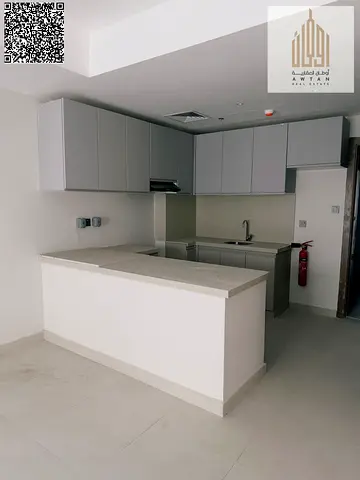 partment for sale Installme in Kintia Residence, Ajman Uptown. Two bedrooms and a living room. Prim