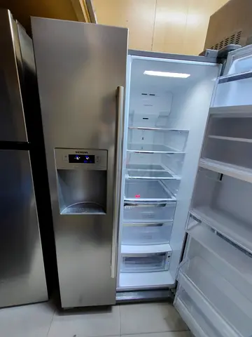 Siemens latest model IQ-700 side by side refrigerator with water depanser and ice maker mini bar