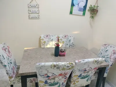 6-Seater Marble-Top Dining Table with Floral Upholstered Chairs