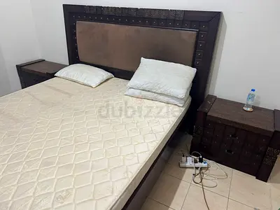 king wooden bed frame with headboard, metress and two matching bedside tables