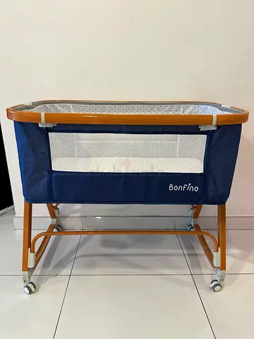 Bonfino bedside bassinet/crib in navy - gently used