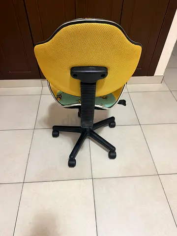 Yellow ergonomic office chair on wheels - good condition