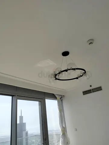 Modern black ring chandelier with glass globe bulbs