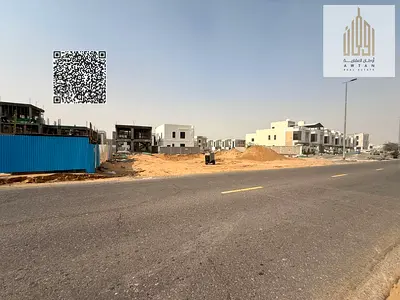 Prime Investment Opportunity Villa Plot on Main Road in Al Helio 2 Ajman