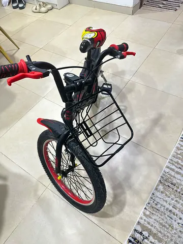 Used kids/teen cycle with front rack and kickstand - good condition
