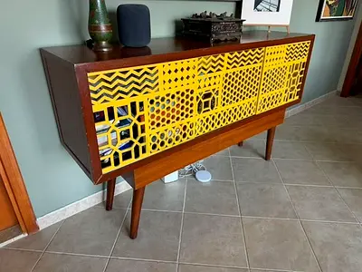 Wooden sideboard with yellow grille