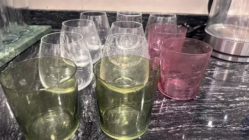 Set of 10 mixed color drinking glasses — good condition