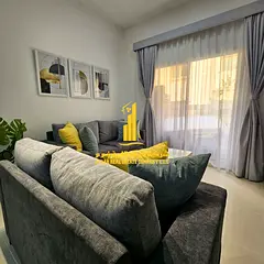 Furnished one-bedroom apartment with new furniture for monthly rent in Ajman - Al Jurf 2 - next to A