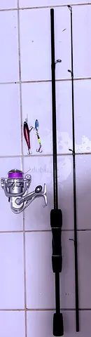 Two-piece spinning fishing rod with reel and lures