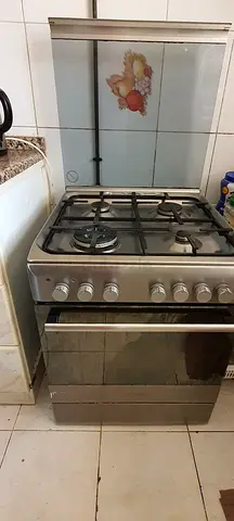 Stainless steel freestanding gas oven and stove - good working condition