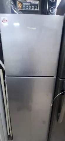 Silver double-door refrigerator - good working condition