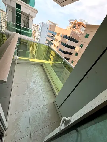 Annual apartment for rent in Sharjah Al Majaz 2 two bedrooms and hall premium finishing on Al Wahda Street master bedroom spacious living room distrib