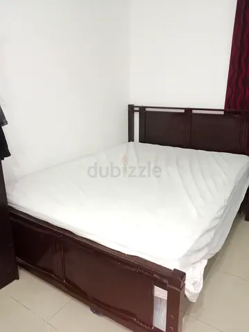 Home wood double bed frame in dark finish - good condition