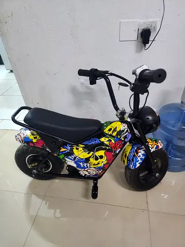 Small electric mini bike/moped - kid/teen size, colorful graffiti design