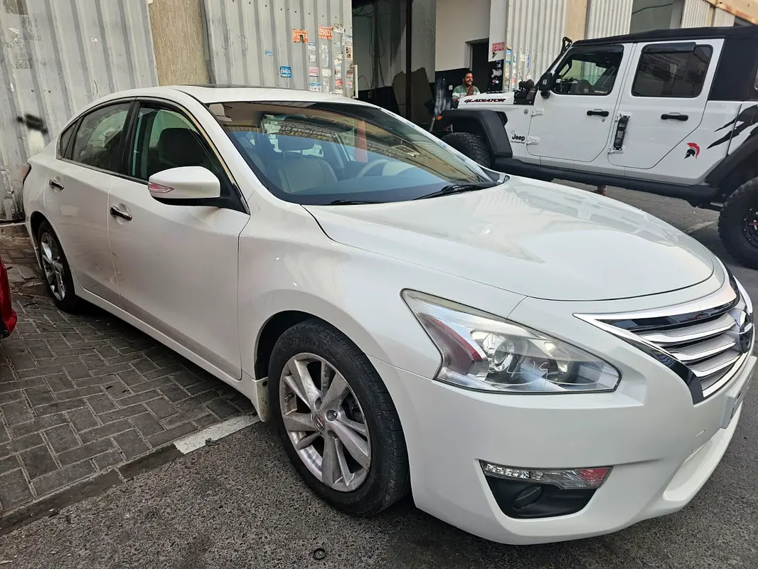 Nissan Altima 2015 — photo 1 of 5