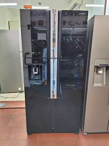 Hitachi latest model 4 door refrigerator with water depanser black glass