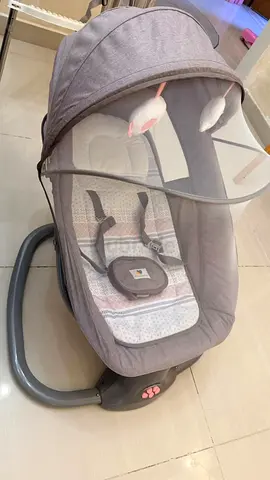 Baby rocker with mosquito net