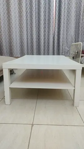White rectangular coffee table with lower shelf - good condition