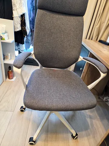 Gray ergonomic office chair on wheels - good condition