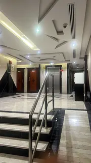 Spacious studio for annual rent in Al Rashidiya 2, behind Falcon Towers. Prime location, close to al