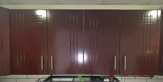 Kitchen cabinets and toilet