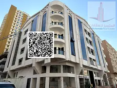 Two-bedroom apartment with a living room, central air conditioning, and hotel-style finishing—Al N