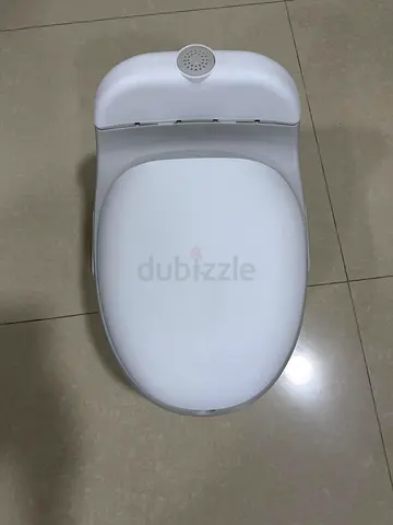 White Baby Potty Trainer - Simple and Clean